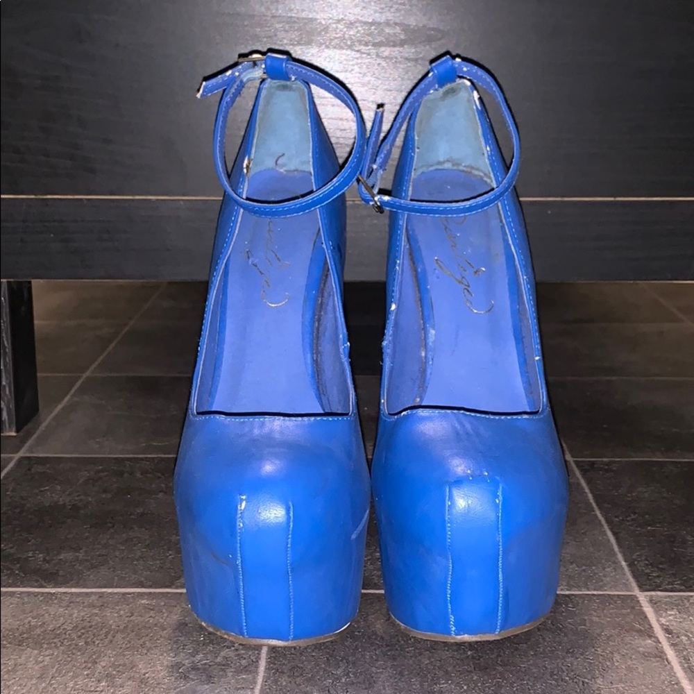 Blue heel less shoes
